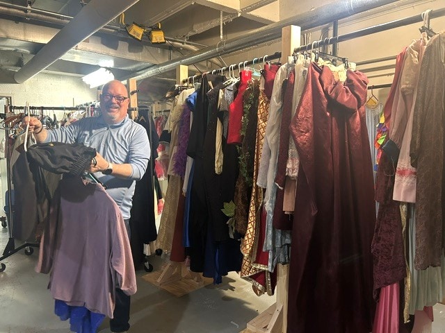 HCO Former Director Mark Roekers helping to sort costumes